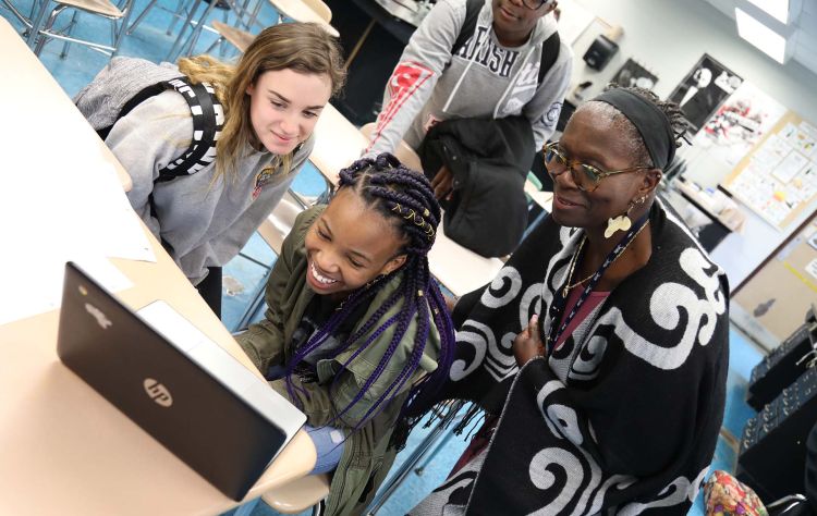 NYSUT board member Selena Durio, pictured at right with students in her North Babylon classroom. 