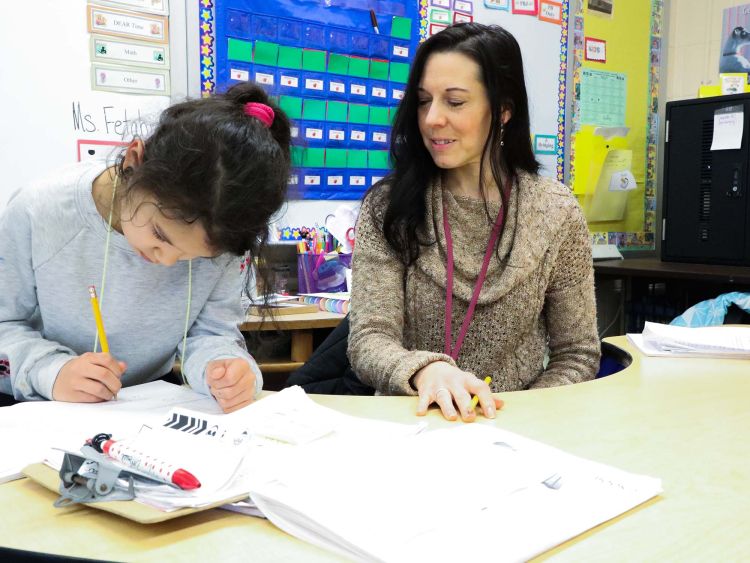 teacher with student