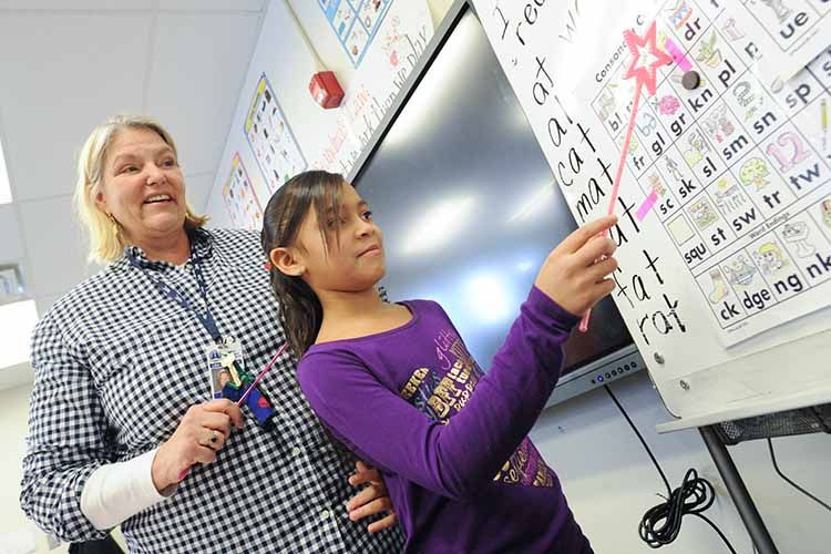 teacher with student